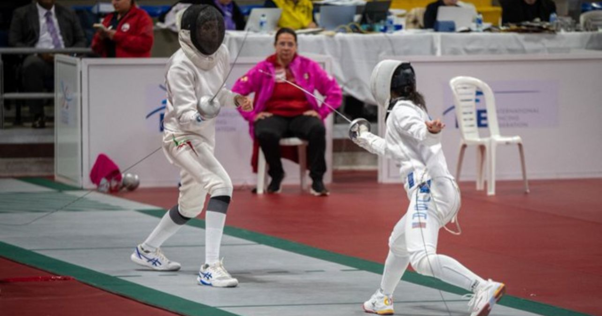 Imagen de dos deportistas compitiendo en el campeonato