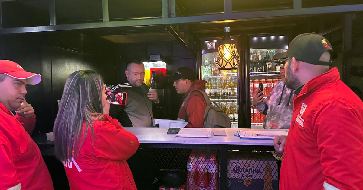 Foto de funcionarios del Distrito en operativo de seguridad