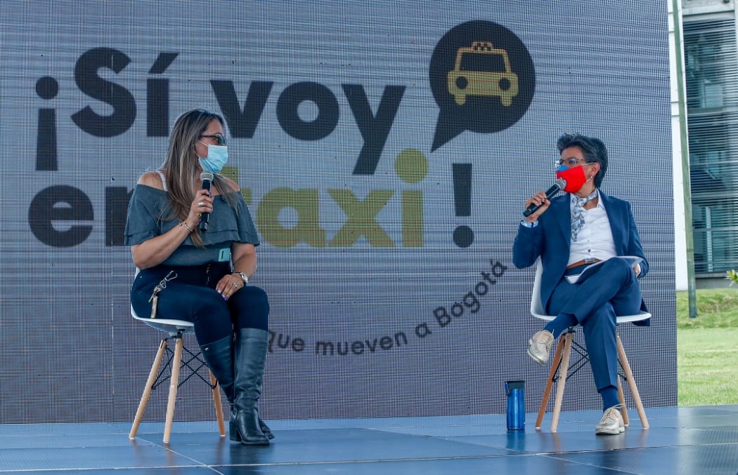 Mayor López at an event with taxi unions