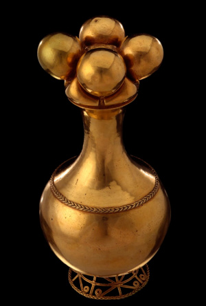 Foto del poporo quimbaya, artesanía muisca elaborada en oro, exhibida en el Museo del Oro de Bogotá.
