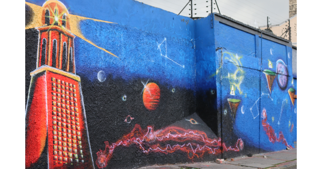 Habitantes de calle pintan mural de 250 m. de largo por 4.5 de alto 