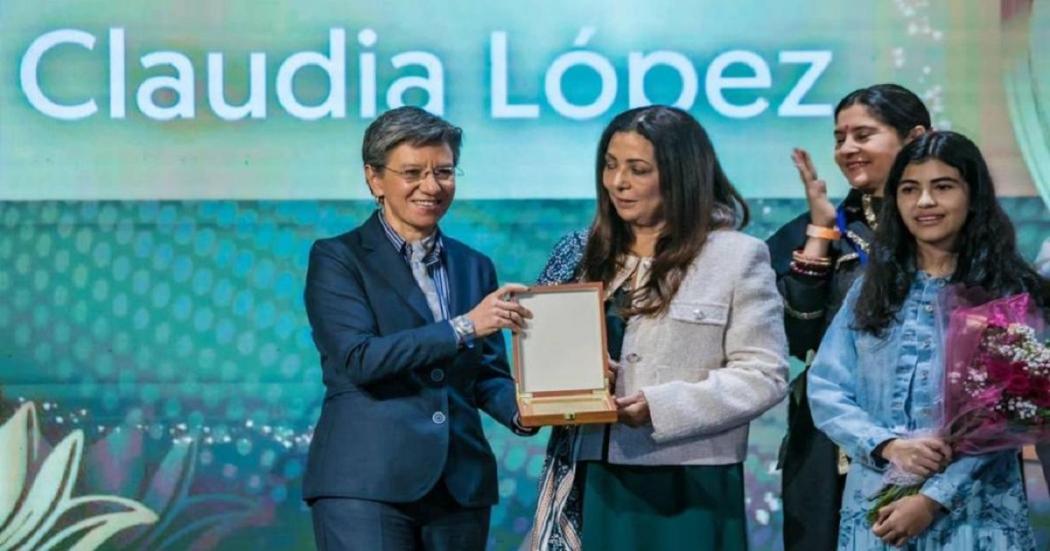 Mayor Claudia López receives the 'Legendary Woman' award during the 4th Edition 