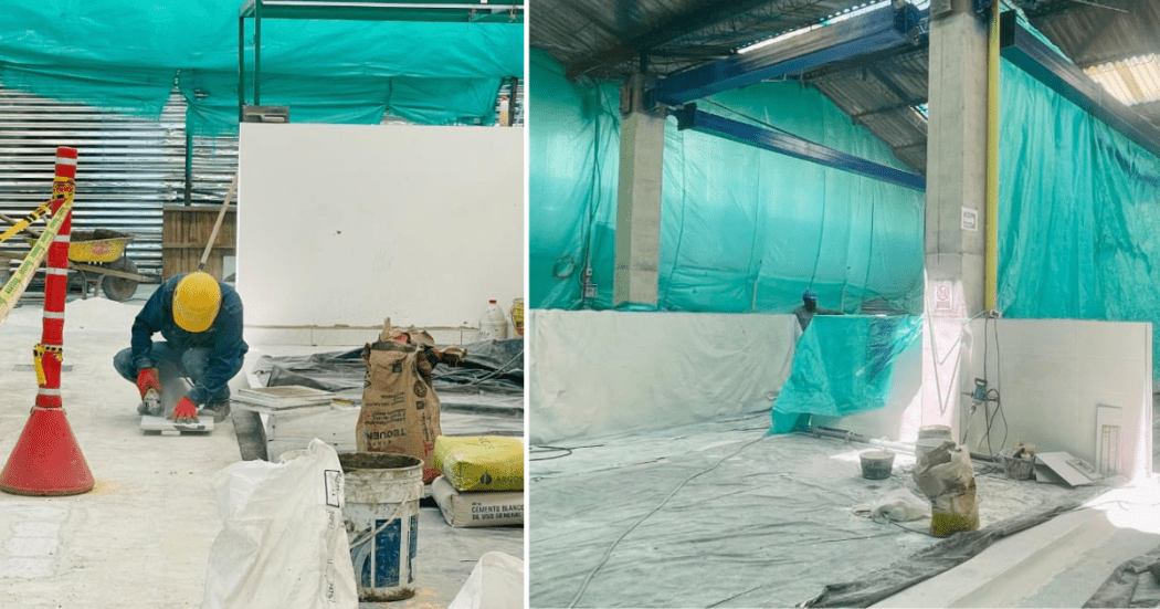 Obras y trabajadores en la Plaza Distrital de Mercado Trinidad Galán de Bogotá.