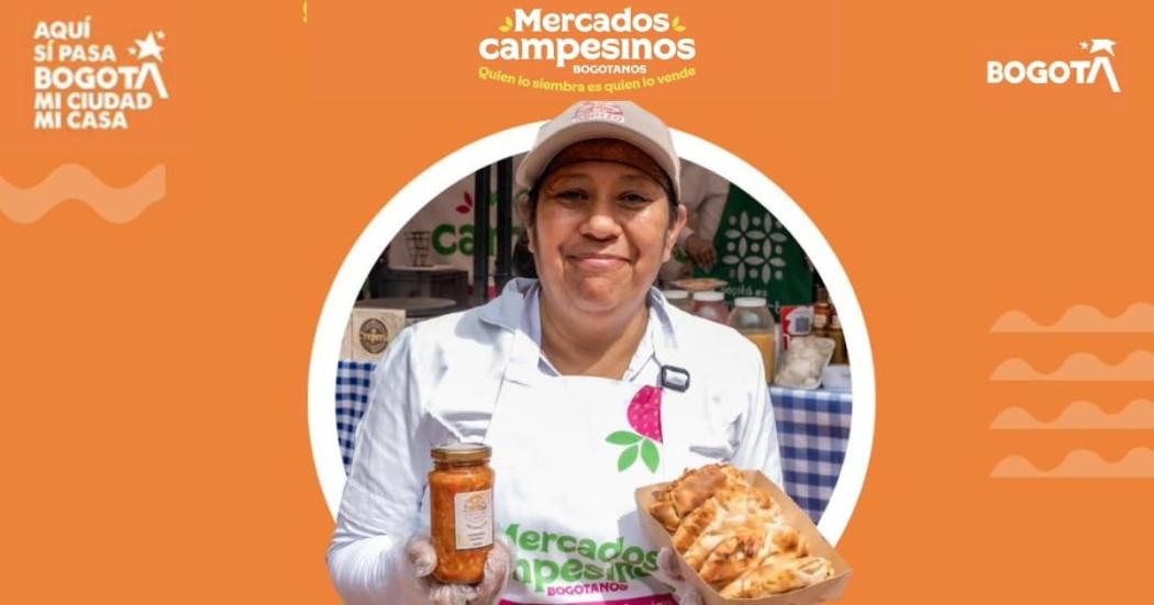 Imagen de los Mercados Campesinos en Bogotá con uno de los campesinos participantes.