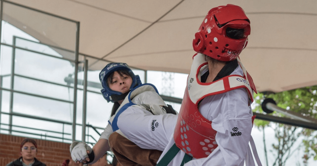 Imagen de dos niños en Combate de Taekwondo