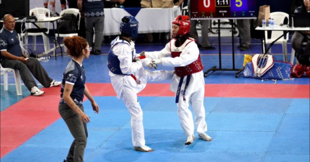 Imagen de deportistas en combate de Taekwondo 