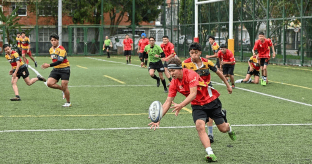 Imagen de deportistas en un partido de Rugby
