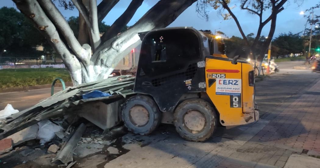 Foto que muestra un carro recogiendo residuos en la calle