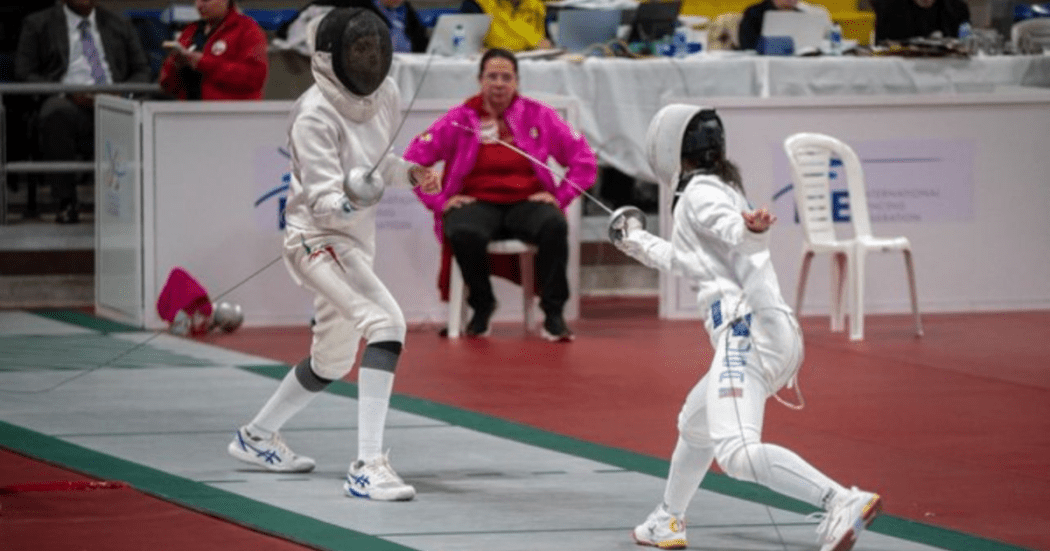 Imagen de dos deportistas compitiendo en el campeonato