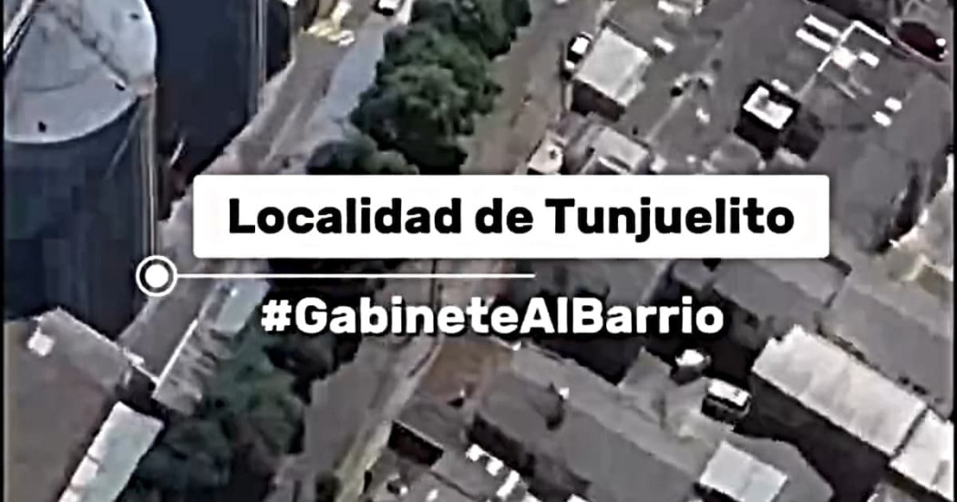 Vista aérea de zona urbana de la localidad de Tunjuelito con edificaciones residenciales e industriales. Texto visible: “Localidad de Tunjuelito” y “#GabineteAlBarrio”.