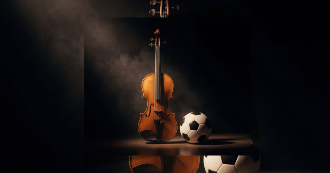 Imagen de un violín con un balón de futbol con un fondo negro 