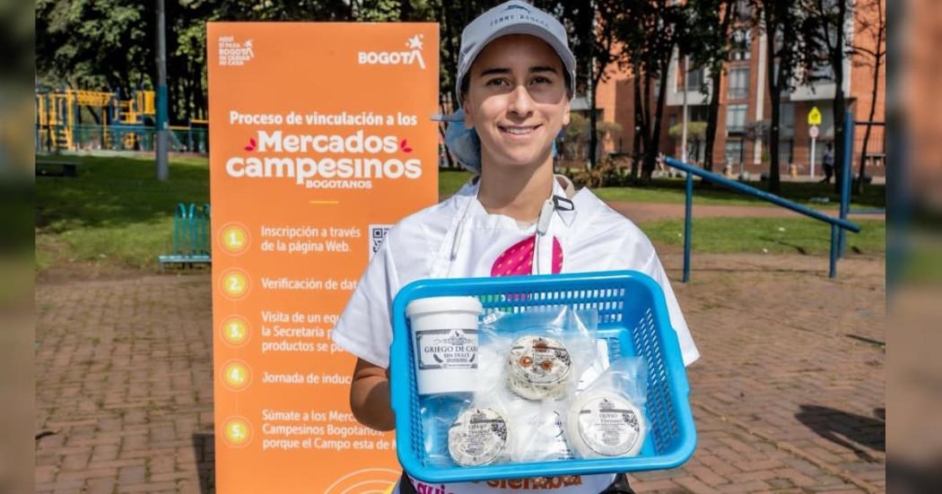 Foto de una mujer campesina en una de lasa ferias de Mercados Campesinos.