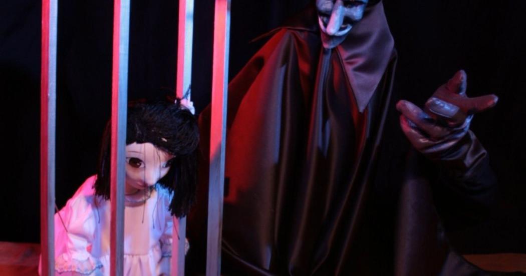 Imagen títeres de una niña y el diablo