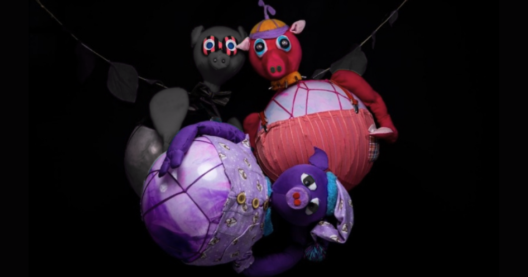 Imagen de los tres cerditos elaborados en croché.