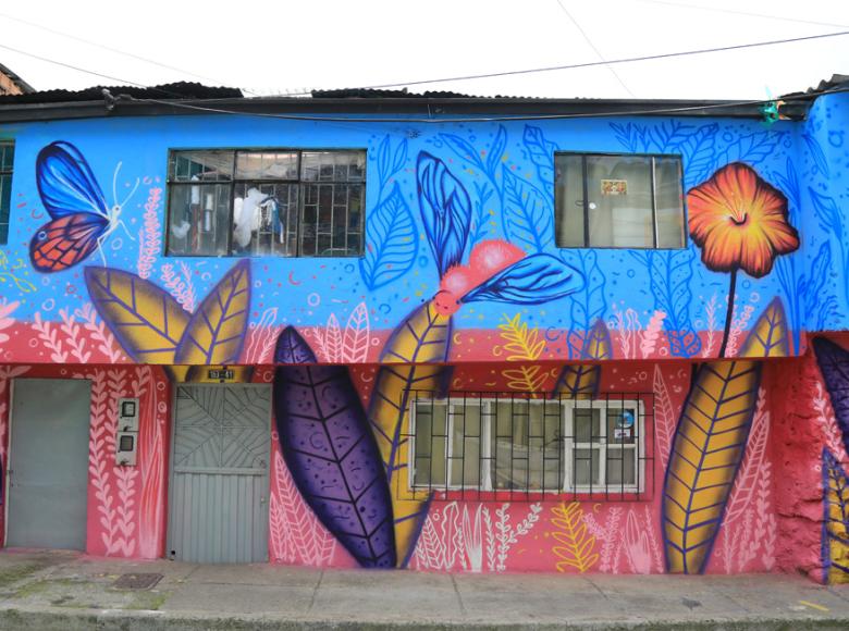 Mural en barrios de La Mariposa embellece fachada - Foto: Secretaría de Hábitat.