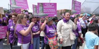 Women participate in a rally
