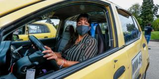 Mayor López at an event with taxi unions