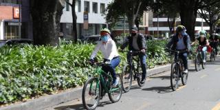 Mayor López riding her bicycle