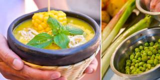 Foto de un plato de ajiaco e ingredientes como arbeja, papa y cebplla.