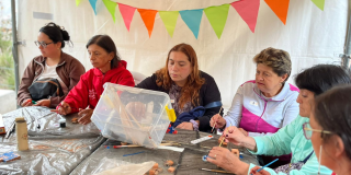 Foto de un grupo de mujeres que participa en un taller. 