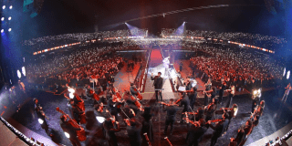 Foto de la Orquesta Filarmónica de Bogotá en ell concierto de Blessd