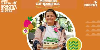 Foto mujer campesina en los Mercados Campesinos de Bogotá.