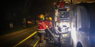 Fotos de personas trabajando en un frente de obra de Bogotá