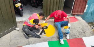 Foto de funcionarios del Distito en jornada de embellecimiento 