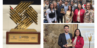 fotografía del premio y los funcionarios de la Secretaría Jurídica