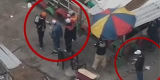 Presuntos expendedores de estupefacientes detectados por dron de la Policía.