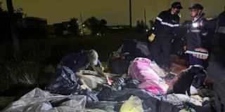 Foto de funcionarios del Distrito en operativo de limpieza.