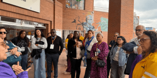 Imagen de varios funcionarios durante la visita del CELAC