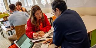 Foto de comerciantes y empresarios en encuentros de fortalecimiento en Bogotá.