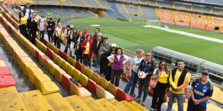 Imagen de persona en una de las tribunas de El Campín