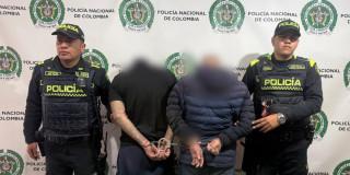 Dos hombres capturados, señalados de robar una bodega de textiles.