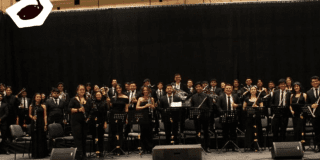 Imagen de los integrantes de la Banda Sinfónica de la Universidad Pedagógica.