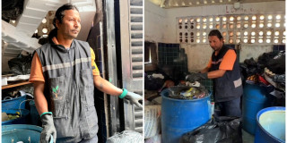 Foto que muestra un hombre separando residuos en canecas