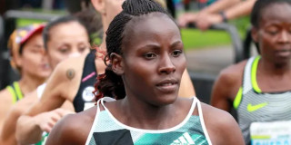 Deportista internacional corriendo en la media maratón de Bogotá