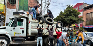 Foto de funcionarios del Distrito en operativo de limpieza