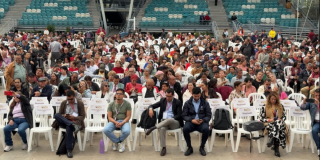 Foto de varios pensionados en la conmemoración del Día del Pensionado 