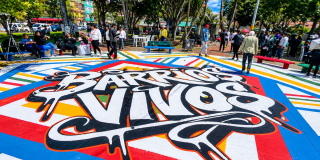 Foto de un suelo pintado con la palabra Barrios Vivos 