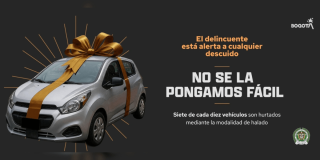 Pieza de la campaña 'No se la pongamos fácil', con la figura de un carro con un moño de regalo.