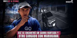Foto de Gestor del Orden con un radio.