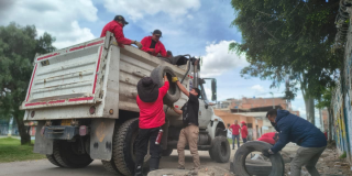 Foto de funcionarios del Distrito en un operativo de limpieza 