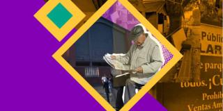 Imagen de un habitante de Bogotá leyendo un periódico 