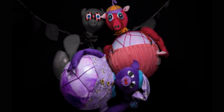 Imagen de los tres cerditos elaborados en croché.