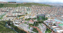 Foto que panorámica de Bogotá que muestra casas y calles 