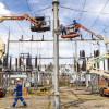 Foto que muestra trabajadores de Enel Colombia realizando labores de mantenimiento