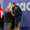 Imagen de deportistas recibiendo las medallas en el podio