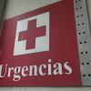 Logo de una cruz roja que dice urgencias.